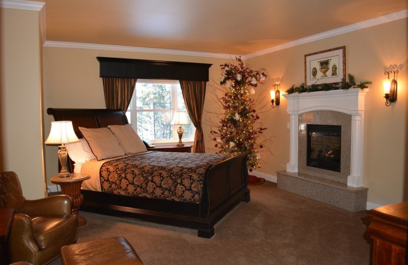 Guest suite with fireplace at Summer Creek Inn & Spa.