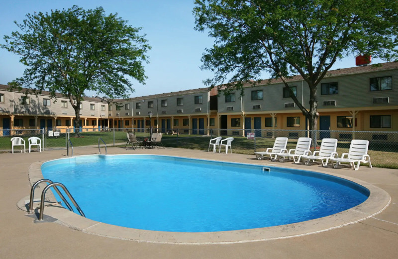 Outdoor pool at Days Inn by Wyndham Bowling Green.