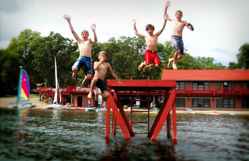 Kids jumping in lake at Fair Hills Resort.