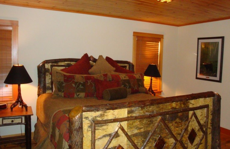 Vacation rental bedroom at Lake Placid Vacation Homes.