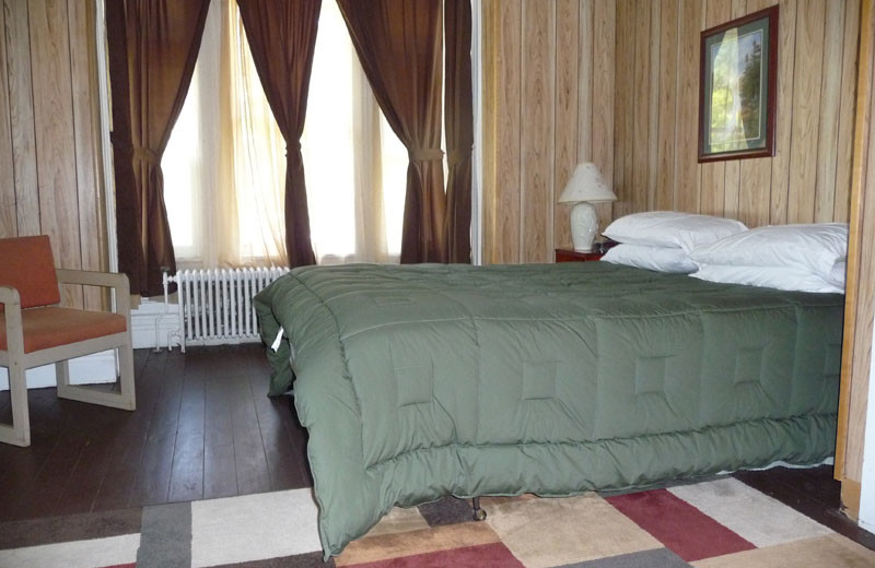 Guest bedroom at The Elms Waterfront Cottages.