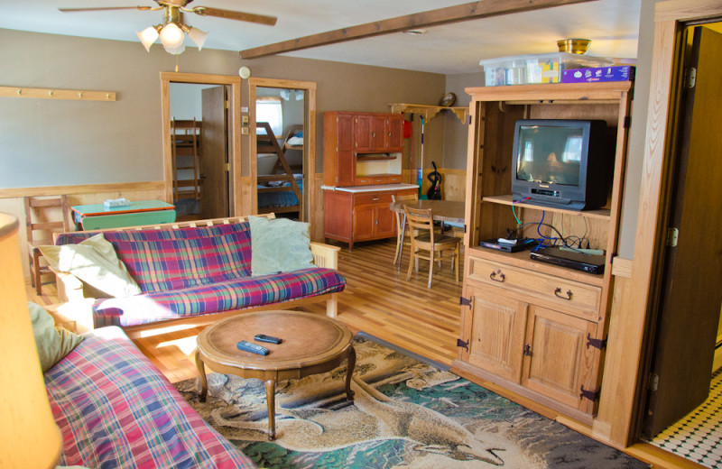 Cabin living room at Tri Lake Timbers Resort.