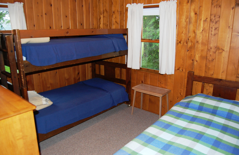 Cottage bedroom at Fisher's Lakeside Cottages.