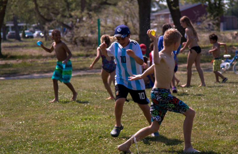 Kids playing game at Great Blue Resorts- Vine Ridge Resort.