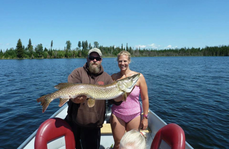 Family fishing at Sandy Beach Lodge.