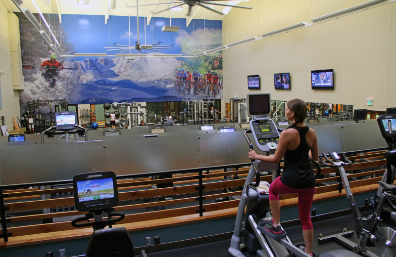 Multi-tier fitness facility with cardio equipment and free weights at Cheyenne Mountain Resort.