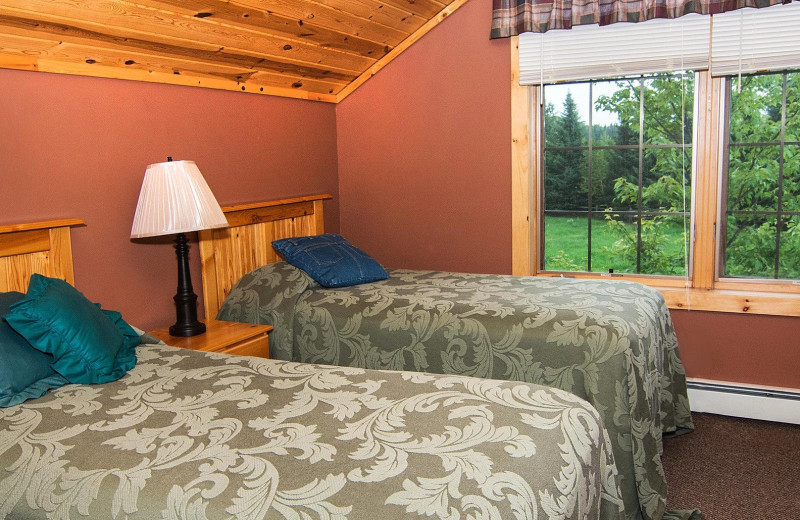 Cabin bedroom at Skyport Lodge.