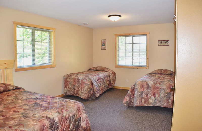 Cabin bedroom at Canary Beach Resort.