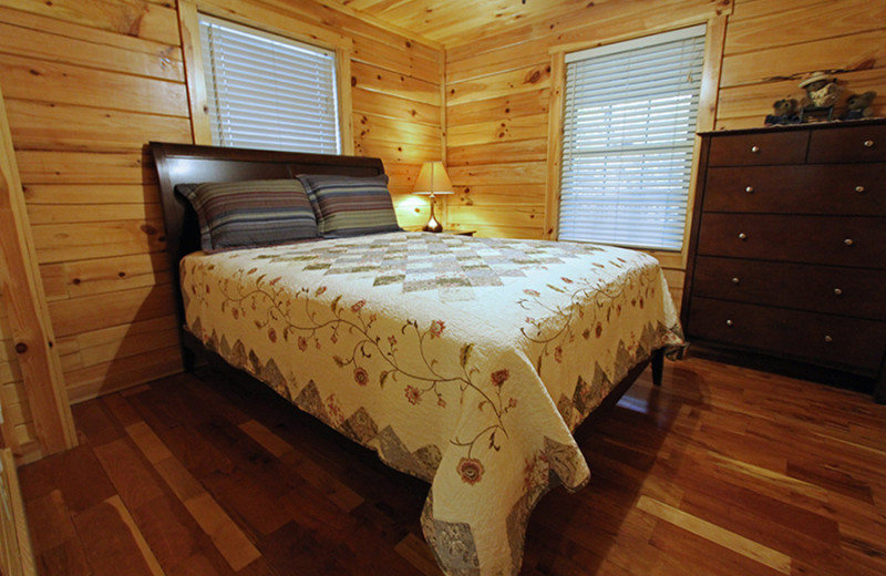 Cabin bedroom at Cut Above Cabins.