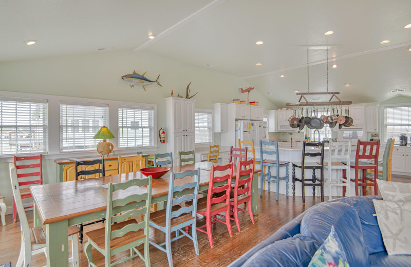 Rental dining and kitchen at Joe Lamb Jr. & Associates Vacation Rentals.