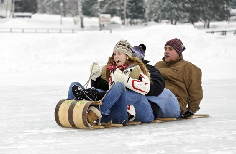 Enjoy fun family sledding at Lake Placid Vacation Homes.