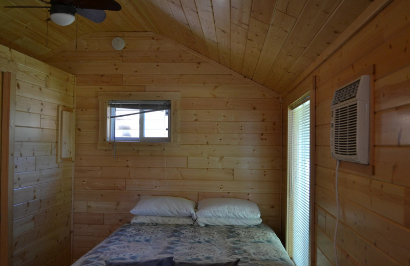 Cabin bedroom at Sand Lake Resort.