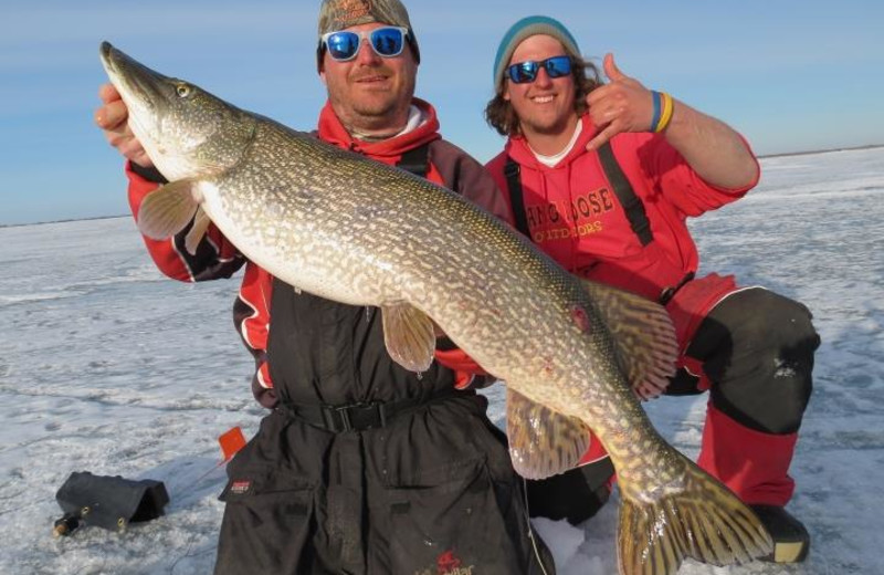 Ice fishing at Slim's Resort.