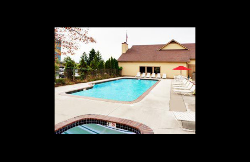 Outdoor pool at Hawthorn Suites Detroit Southfield.