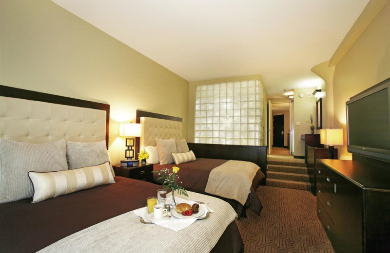 Guest room at The Atheneum Suite Hotel.