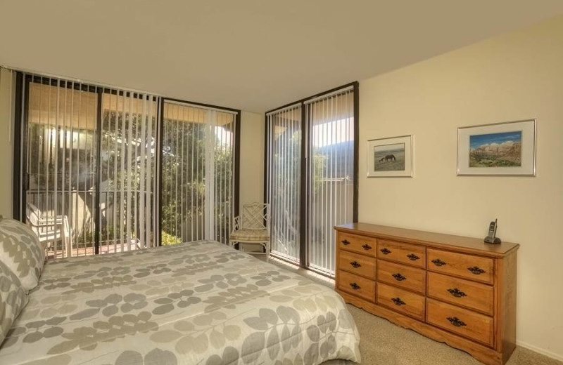 Rental bedroom at Vacation Rentals by McLain Properties.