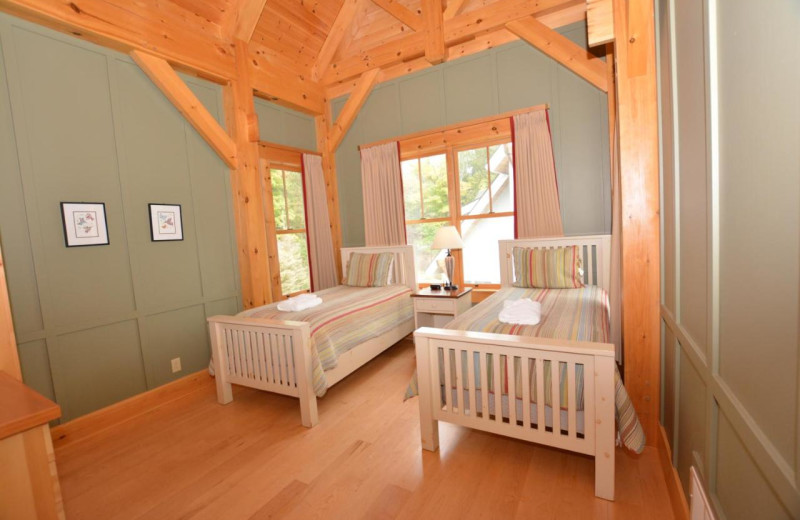 Cottage bedroom at Port Cunnington Lodge & Resort.