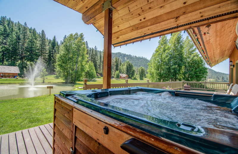 Cabin hot tub at Mountain Springs Lodge.