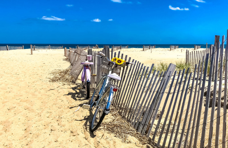 Bikes on beach at Joe Lamb Jr. & Associates Vacation Rentals.