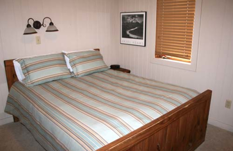 Vacation rental bedroom at Snowshoe Properties Management.