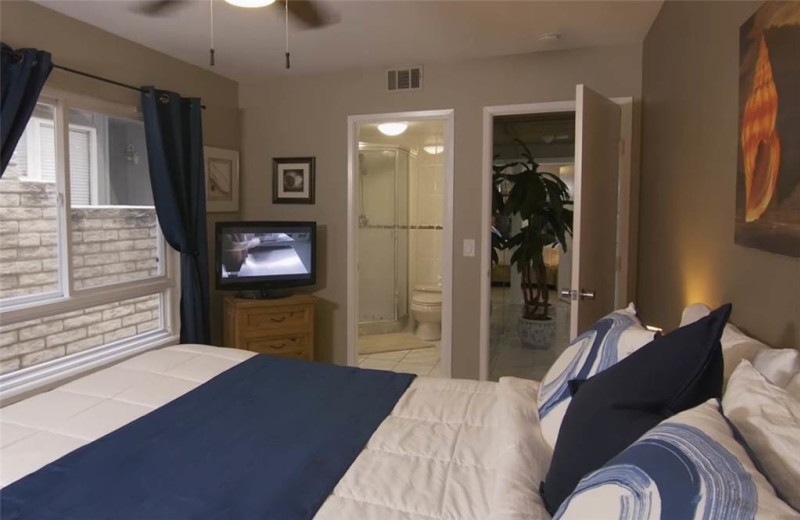 Rental bedroom at Vacation Rentals by McLain Properties.