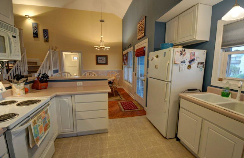 Vacation rental kitchen at Century 21 Action Inc.