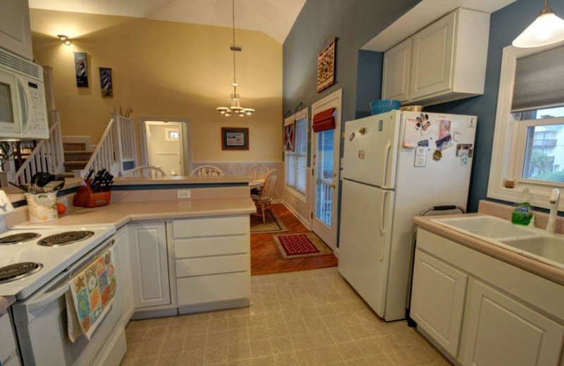 Vacation rental kitchen at Century 21 Action Inc. 