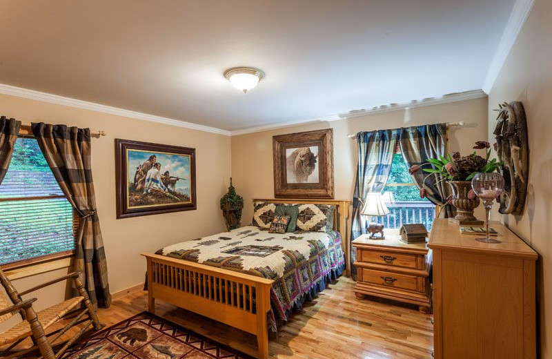Cabin bedroom at Mountain Oasis Cabin Rentals.