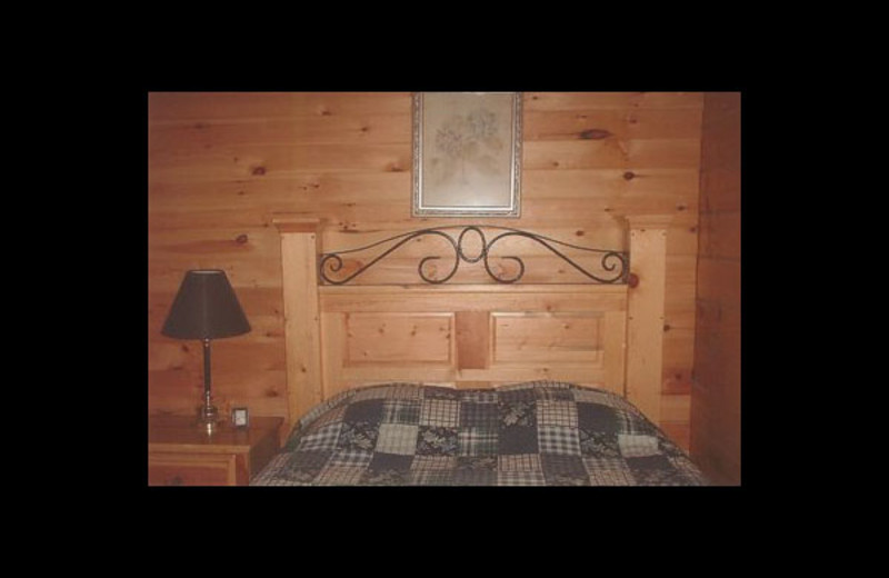 Cabin bedroom at Honey Fork Properties.