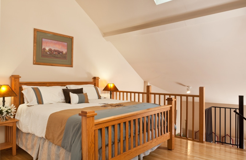 Country Oak Loft bedroom at HideAway Country Inn.