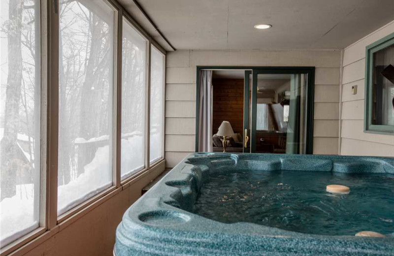 Cabin hot tub at Big Powderhorn Lodging Association.