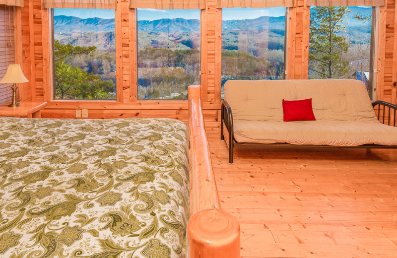 Cabin bedroom at SmokyMountains.com.