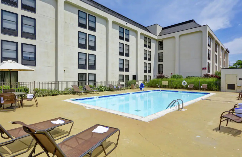 Outdoor pool at Hampton Inn Detroit-Northville.