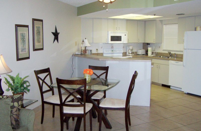 Rental kitchen and dining area at Gulf Strand Resort.