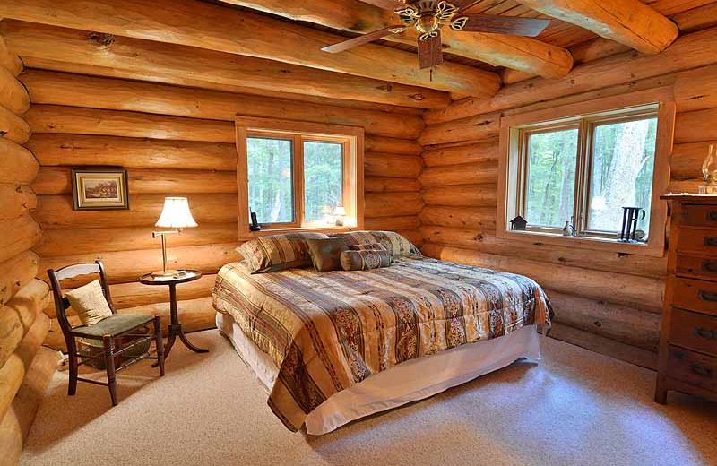 Cabin bedroom at North Country Vacation Rentals.