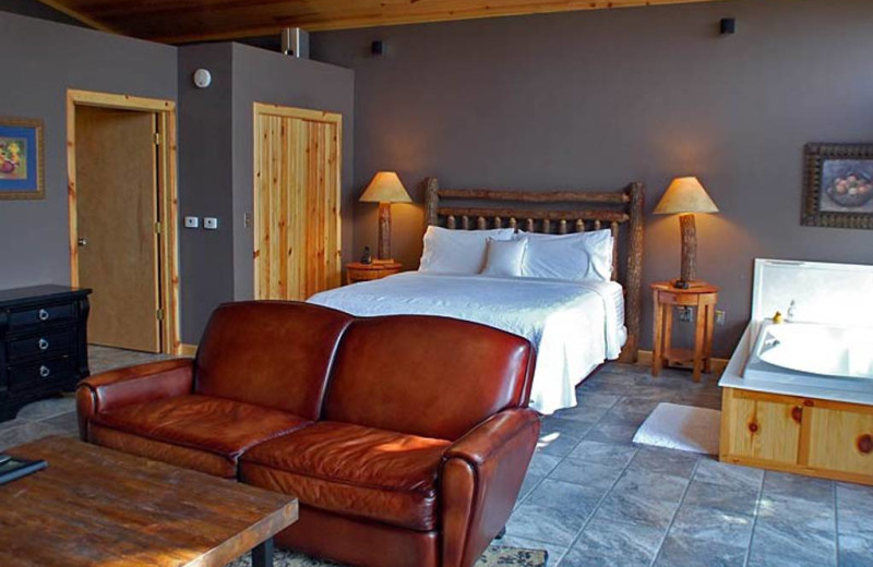 Cabin bedroom at Beaver Lakefront Cabins.