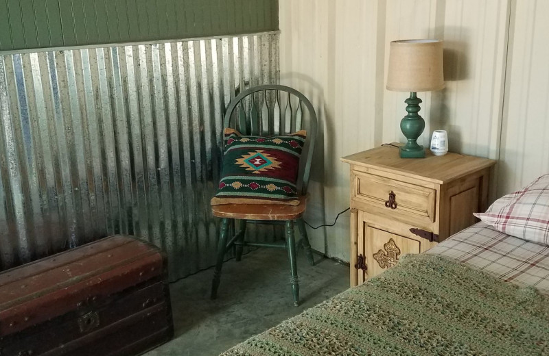 Cabin bedroom at Mustang RV Ranch.