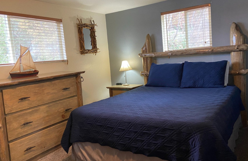 Cabin bedroom at Watson's Harverene Resort.