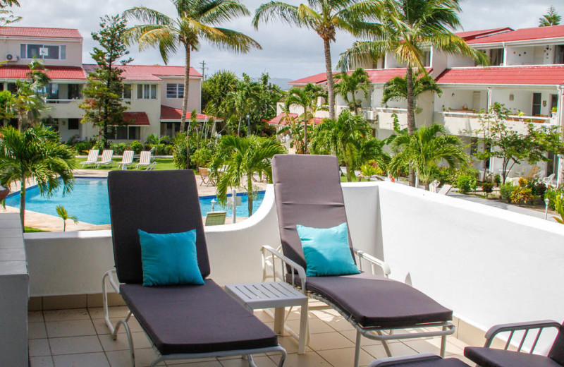 Outdoor pool at Antigua Village Beach Resort.