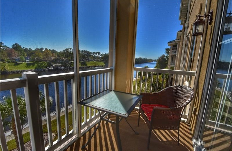 Rental balcony at Barefoot Resort Rentals.