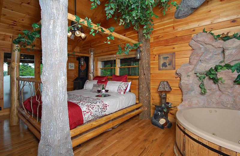 Cabin bedroom at Timber Tops Luxury Cabin Rentals.