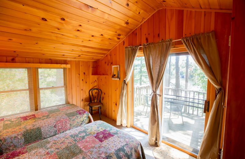 Cabin bedroom at Ludlow's Island Resort.