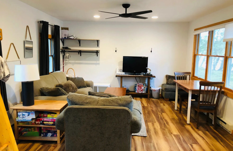 Cabin living room at The Knotty Pine Cottage    Bunk.