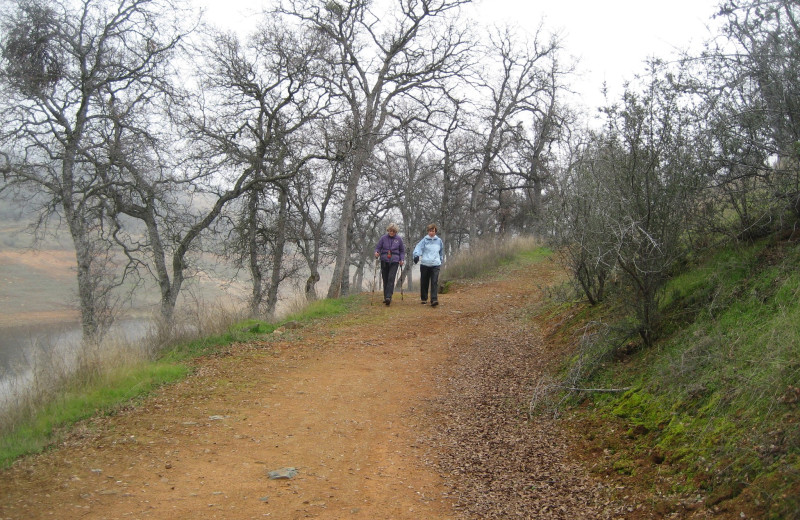 Hiking along the lake at Lake Don Pedro.