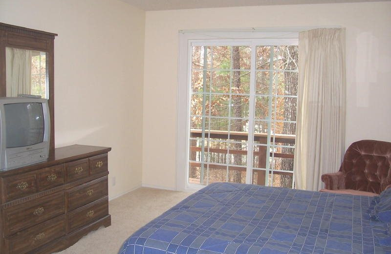 Rental bedroom at Village Villas Vacation Rentals.