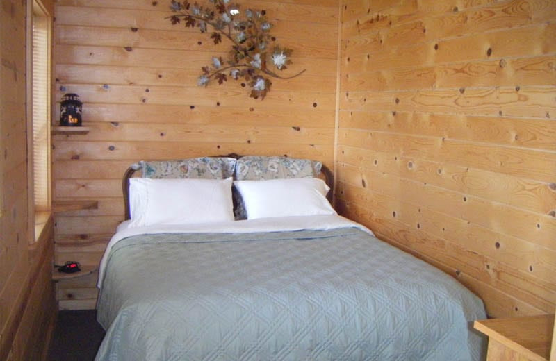 Cabin bedroom at Silver Beach Resort.
