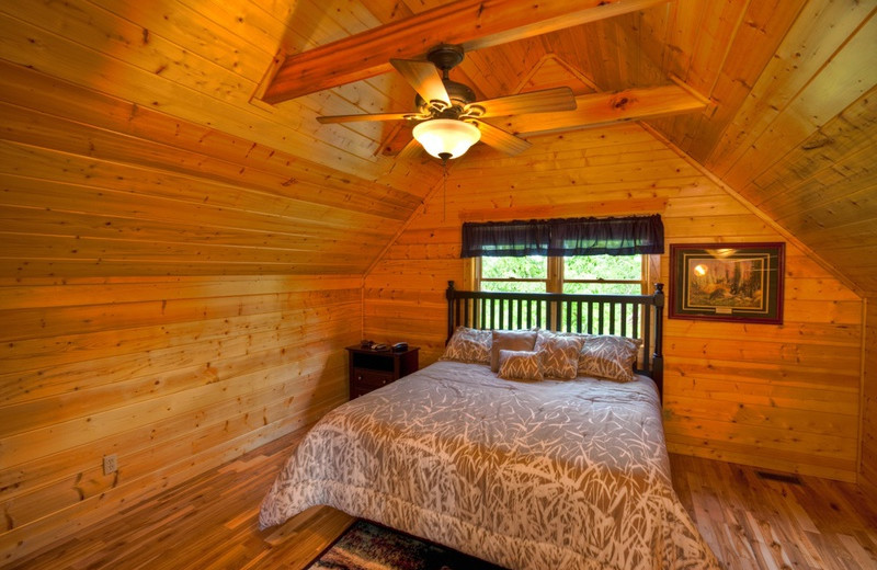 Cabin bedroom at The Cabin Rental Store.