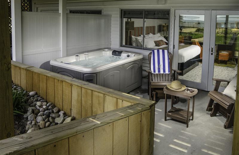 Guest patio and hot tub at Huron House.