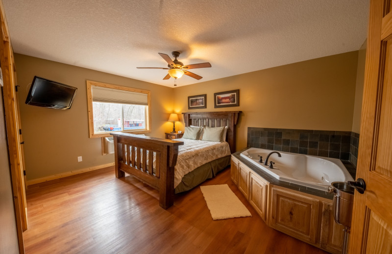 Guest suite bedroom at Appeldoorn's Sunset Bay Resort.