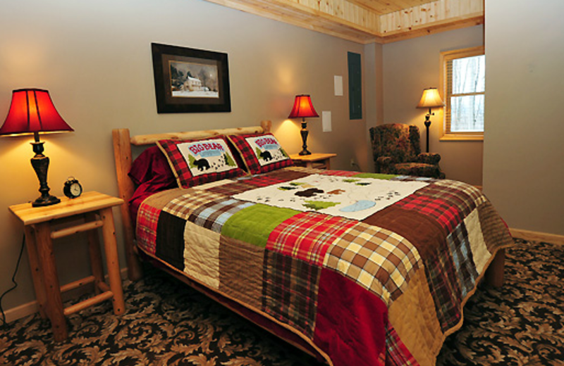 Vacation rental bedroom at Timberline Mountain-Access Properties.